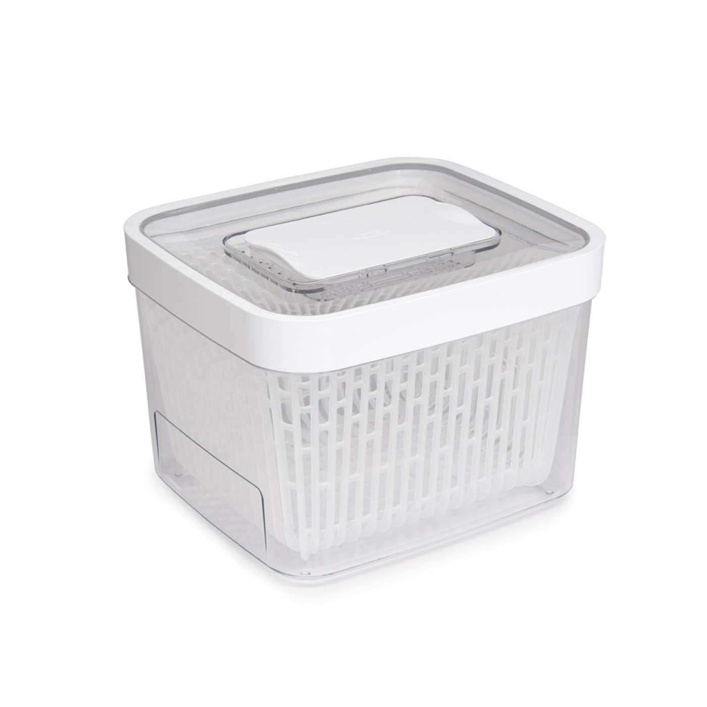 A clear plastic OXO GREENSAVER PRODUCE KEEPER with a white lid and removable baskets.