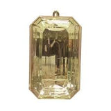 This image features a striking rectangular jewel, possibly a diamond or a diamond-like stone, set in a simple yet elegant gold frame. The jewel exhibits a vibrant yellow hue, suggesting a high quality and cleanness, likely indicating a valuable and luxurious item.