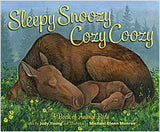 Book cover of 'Sleepy Snoozy Cozy Coozy' with two bears lying down in a forest.