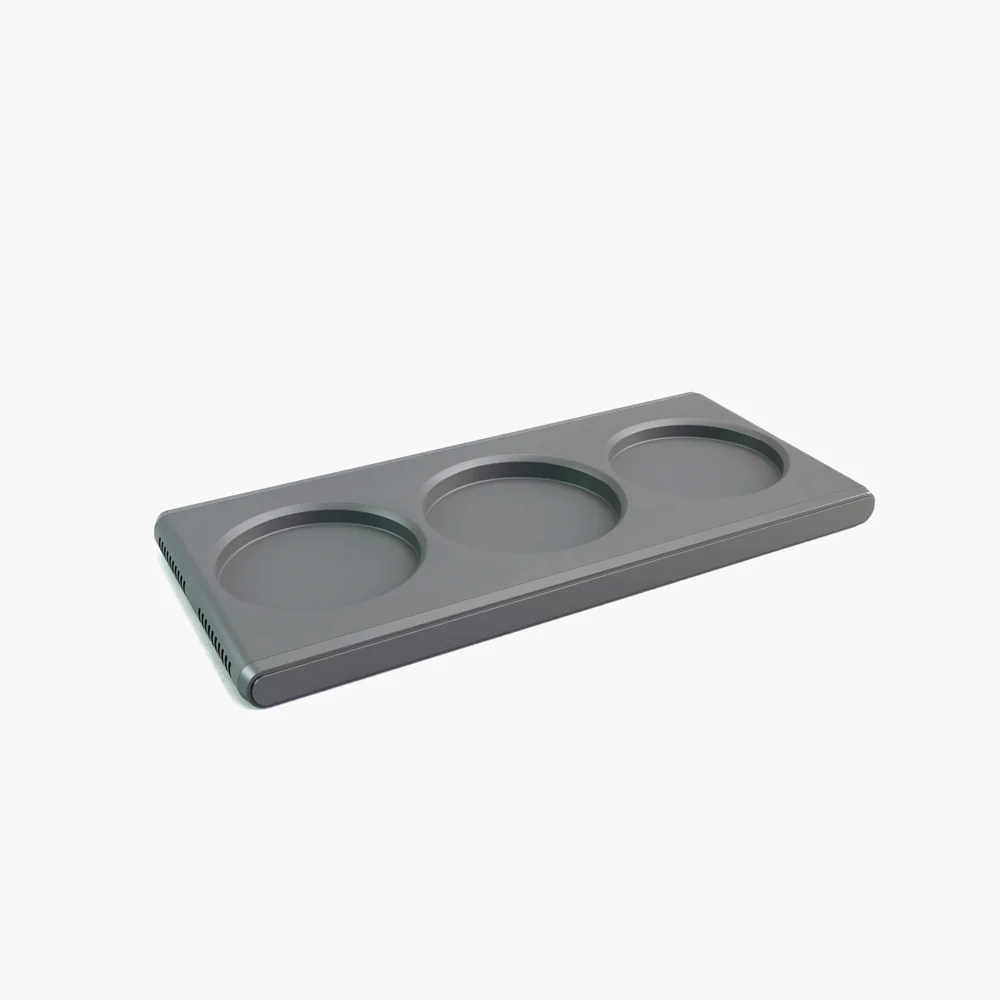 gray tray that holds three pods