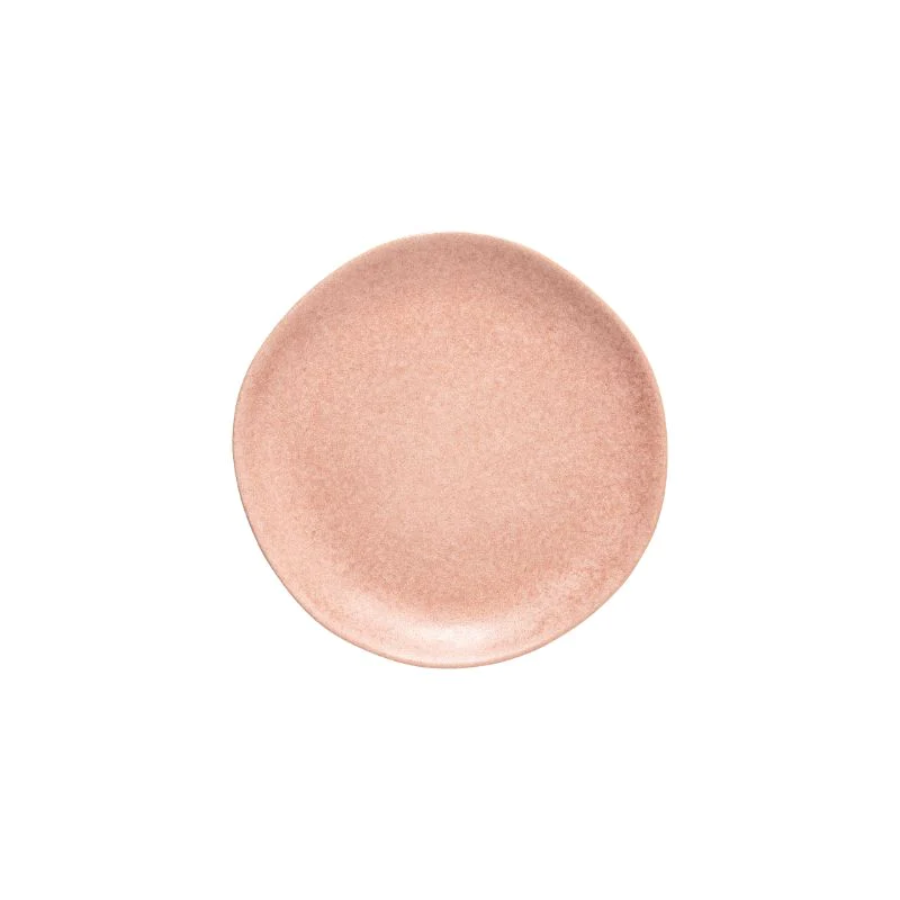 A beige-colored ceramic dinner plate with a simple, solid color design.