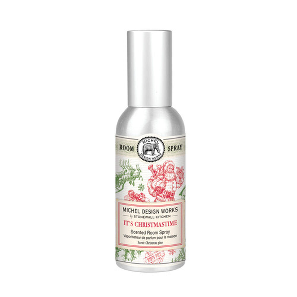 A bottle of MD IT'S CHRISTMASTIME HOME FRAGRANCE with a label featuring holiday motifs.