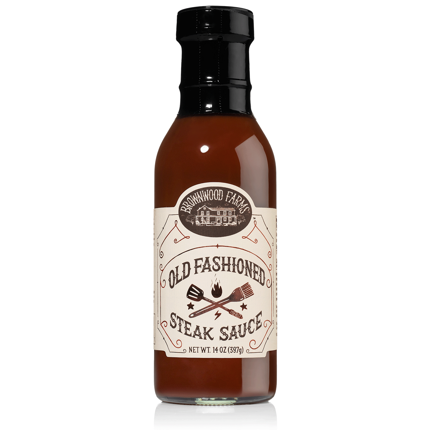 A bottle of old fashioned steak sauce with a label that includes crossed steak knives and the text 'OLD FASHIONED STEAK SAUCE'.