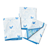 Set of three blue and white patterned cloths on a white background