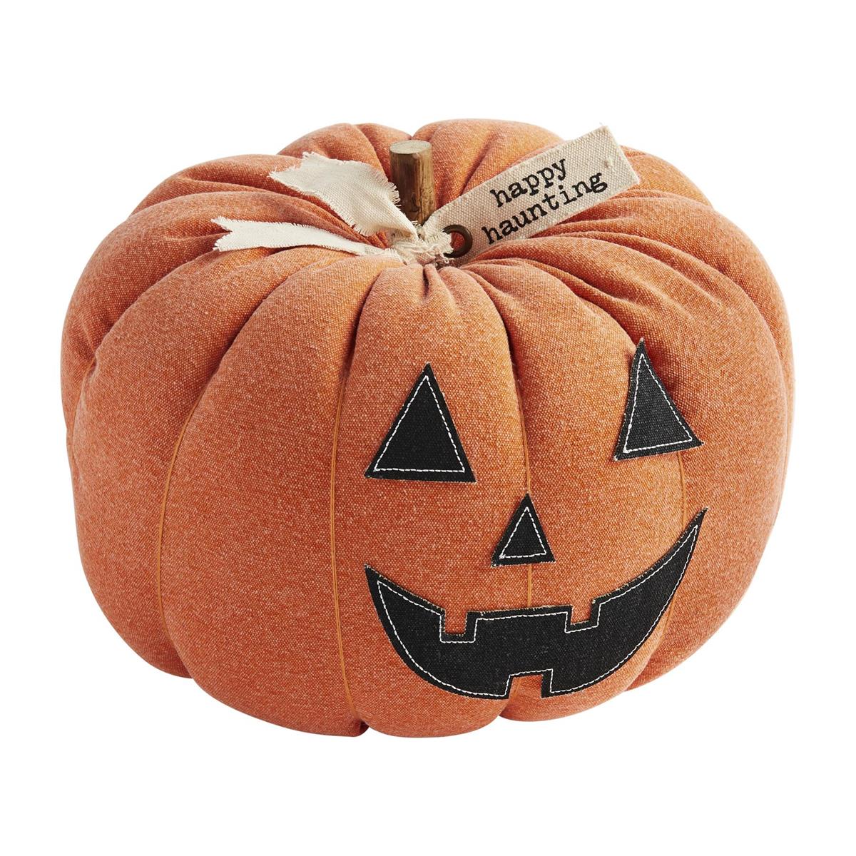 A plush orange pumpkin sitter with a happy face and the text 'happy haunting' on a tag.