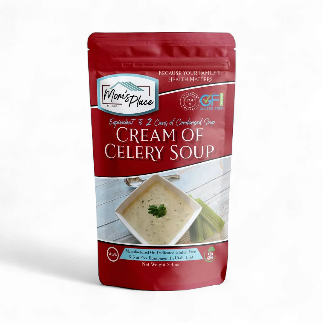 A stand-up pouch of Mon's Place Cream of Celery Soup, shown against a plain white background. The packaging is primarily red with a photo of the creamy soup in a bowl and celery stalks on the front.