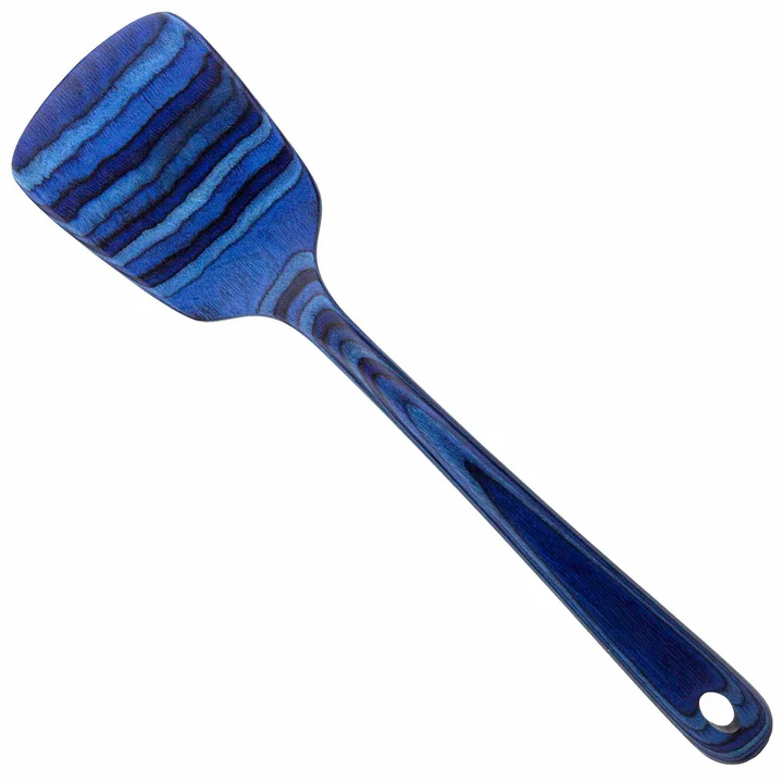 A blue and white striped spatula with a wooden handle.