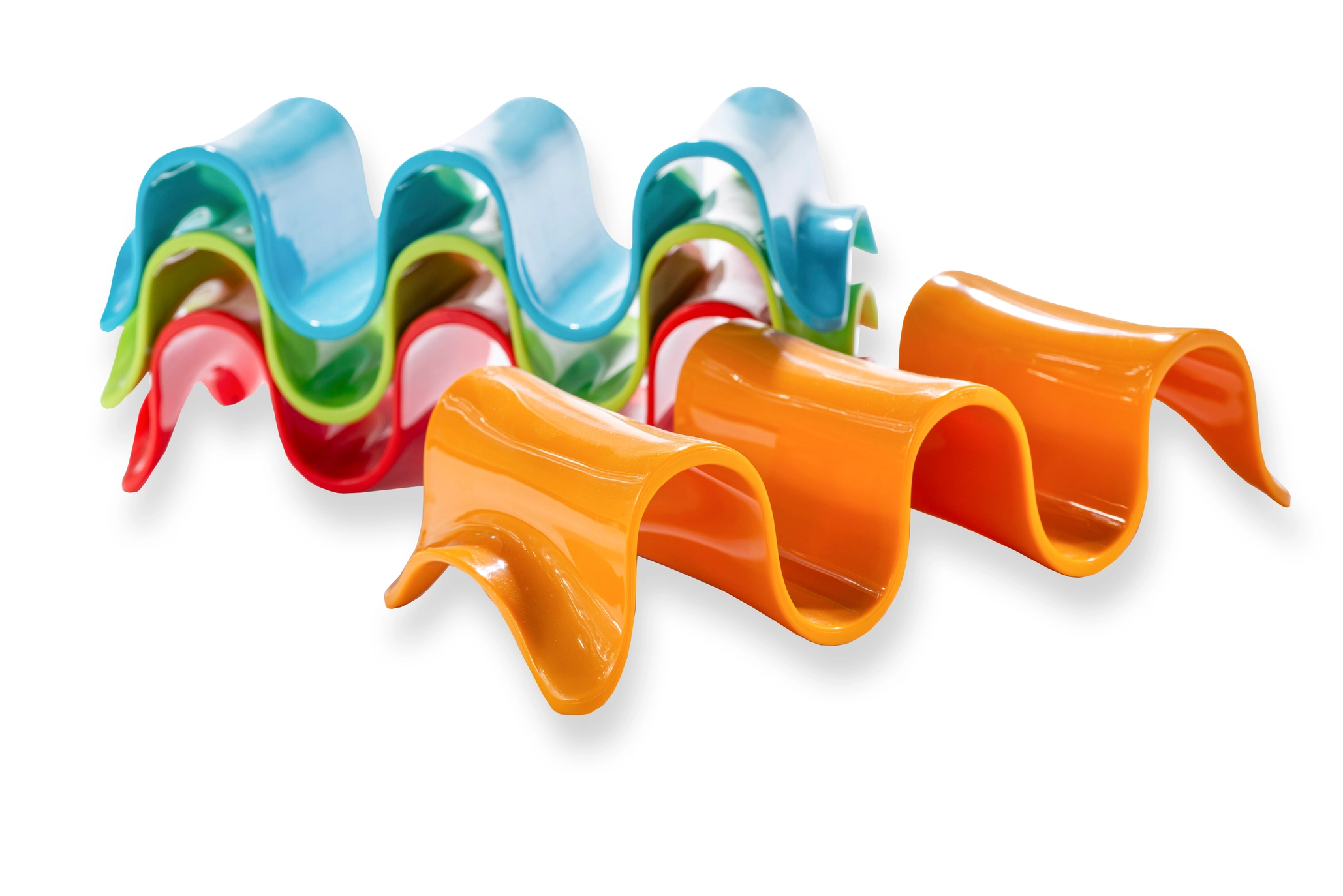 A set of four colorful Taco Holders made of silicone, in red, blue, green, and orange colors.