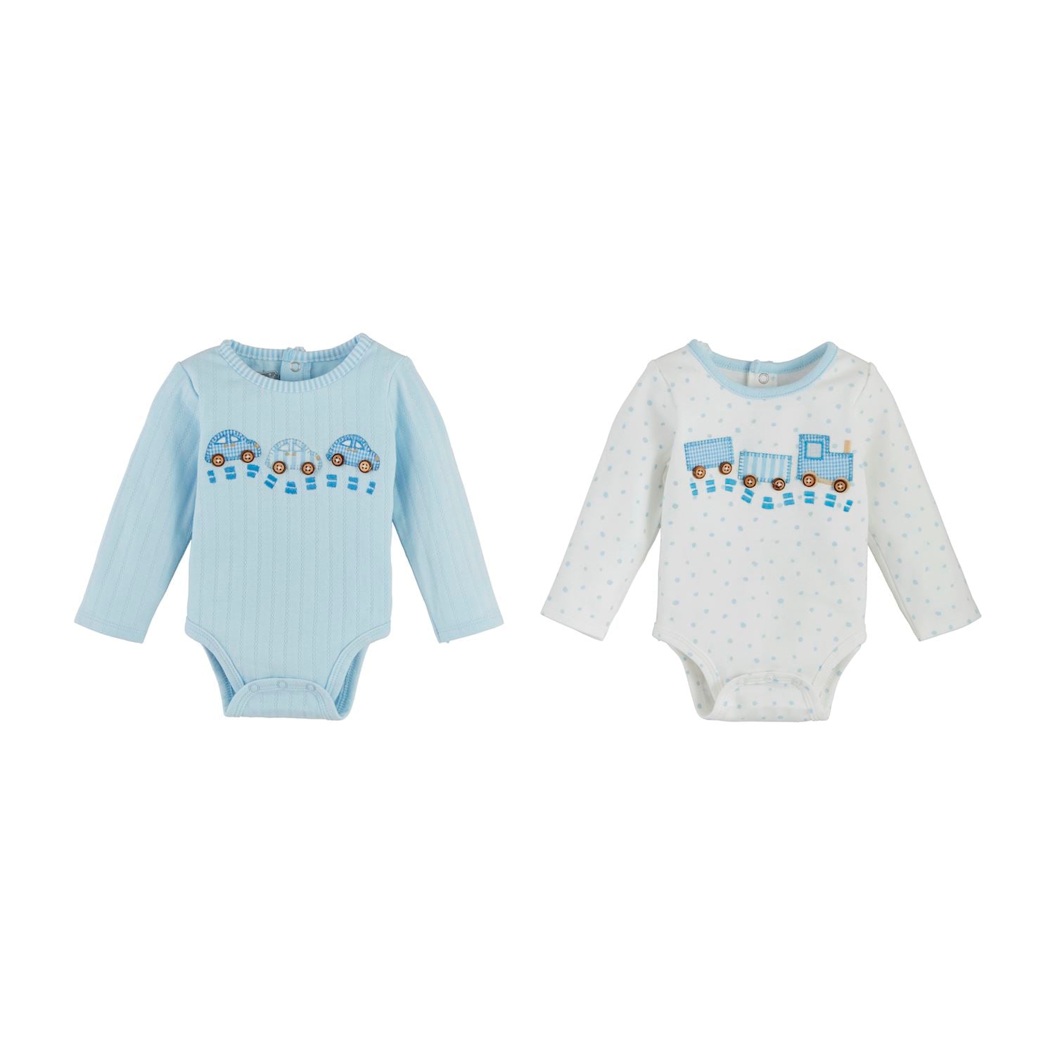 Two bodysuits for babies, one in light blue with a train design, and one in white with a similar design.