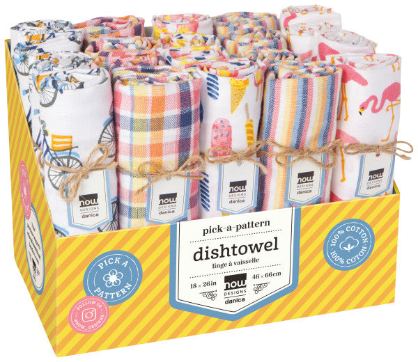 A display box containing rolled-up dishtowels in various patterns, tied with twine and labeled with the brand name and the product name 'dishtowel'.