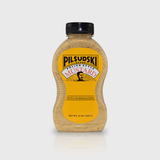 A bottle of Pilsudski Mustard with Horseradish, displaying the label and cap against a white background.