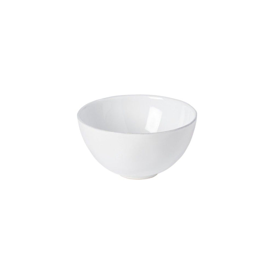 A beige ceramic cereal bowl with a textured surface.