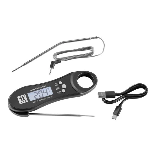 A thermometer with a prop and a chafing cable on a white background  