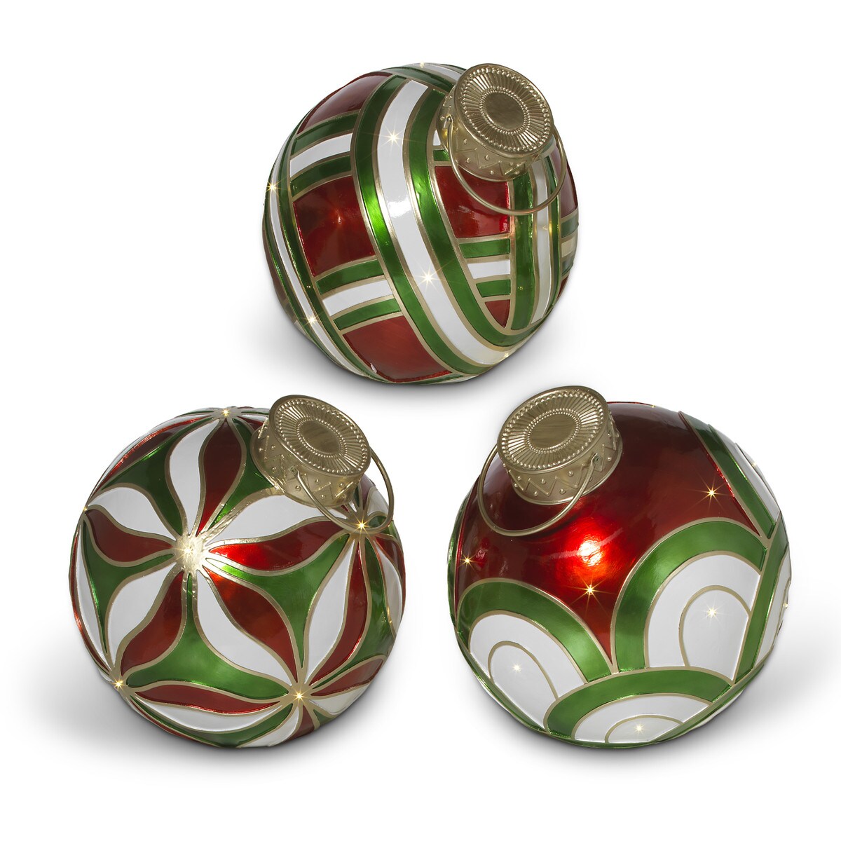 Three spherical Christmas ornaments with geometric patterns in red, green, and white colors.