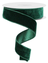 A roll of green velvet/satin backing ribbon.