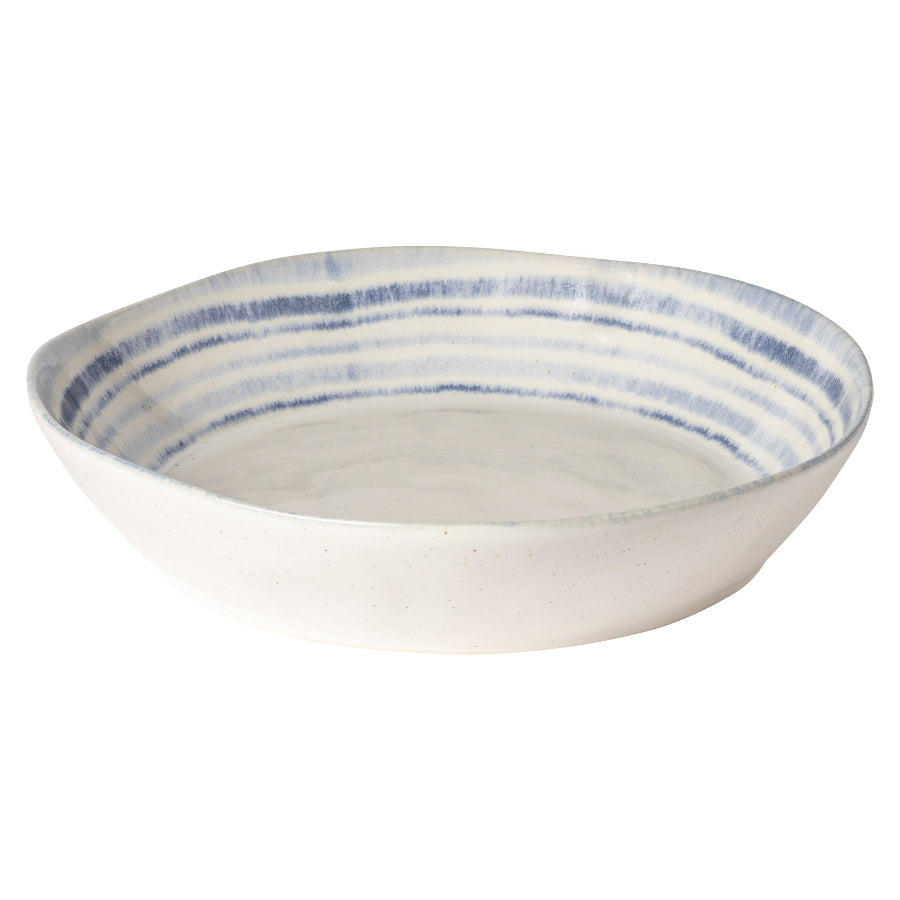 A ceramic Nantucket Pasta Bowl with blue and white colors on a white background.