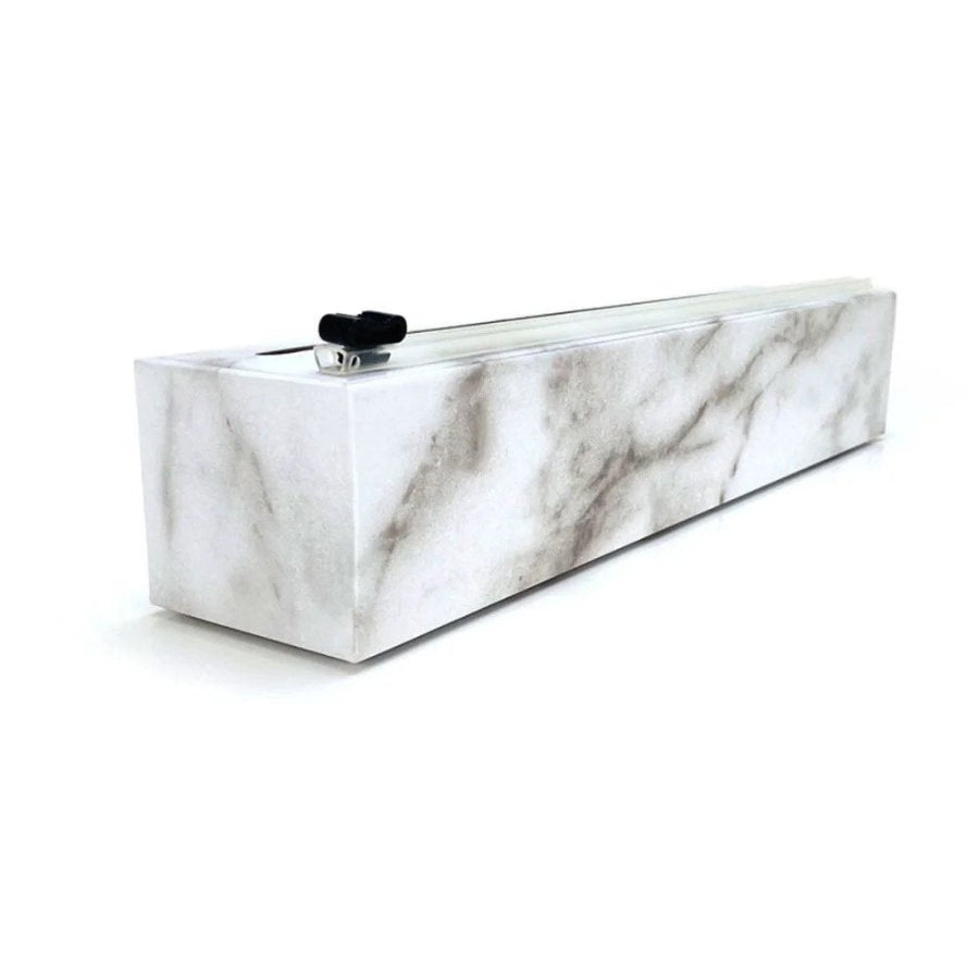 A white marble Chic Wrap Dispenser designed for dispensing cling wrap, foil, or parchment paper.