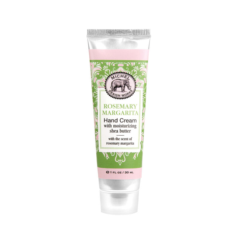 A tube of MD HAND CREAM 1 OZ with a green and pink label, featuring organic ingredients and a sparkling citrus scent with rosemary, raspberry, and a hint of musk.