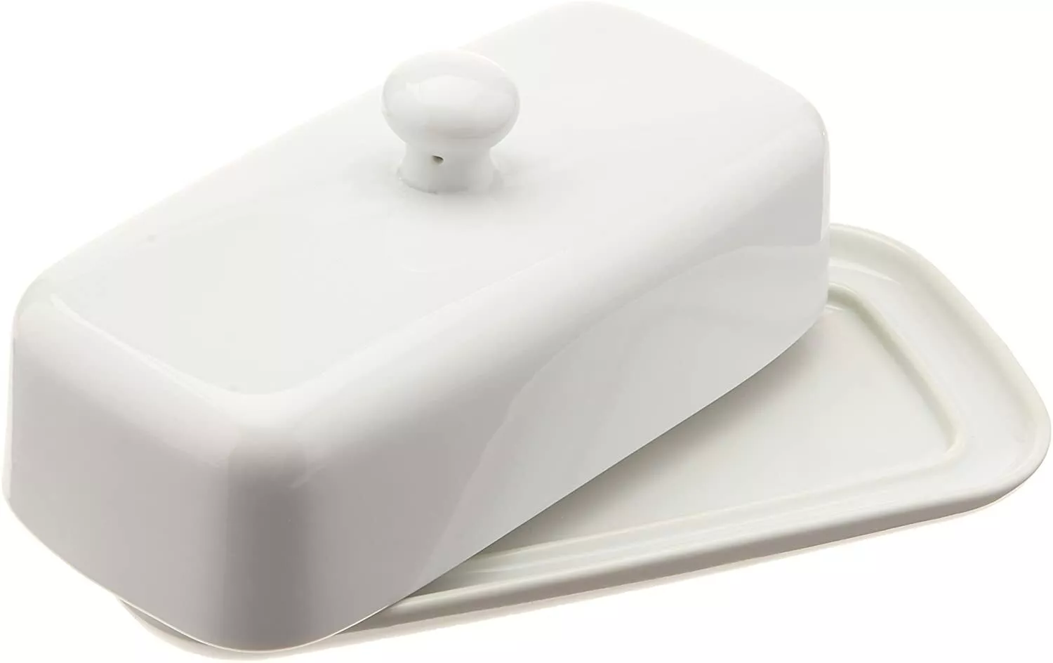 A white ceramic butter dish with a lid.
