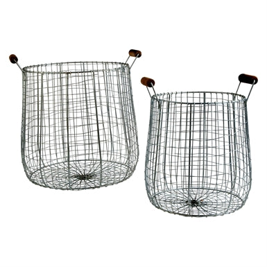 Two tall wire farm baskets with wooden handles.