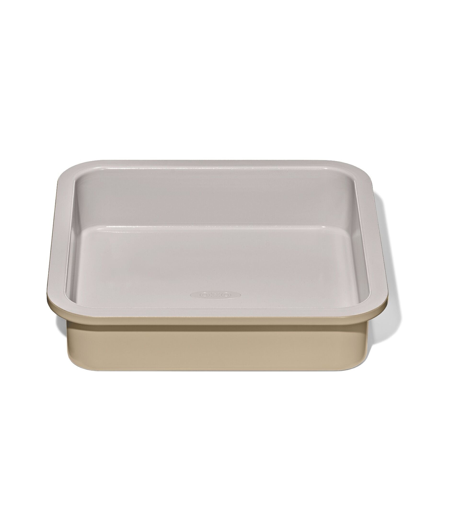 Rectangular baking dish with beige interior and exterior on a white background
