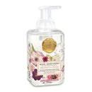 foaming soap on white background