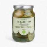 Jar of pickled garlic dill pickles with a label on a white background