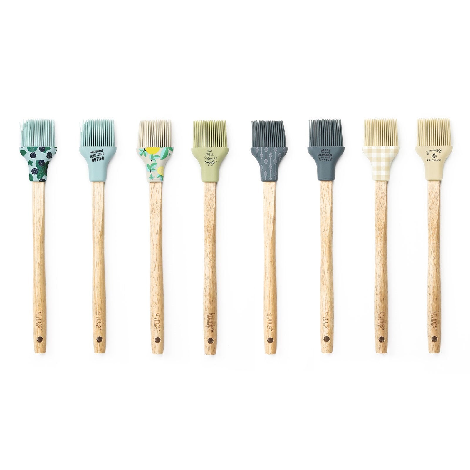 A set of basting brushes with wooden handles and synthetic bristles in various solid colors and patterns.