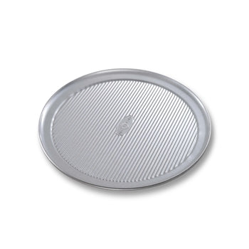 A round, silver-colored pizza pan with a textured surface and a visible brand logo in the center.