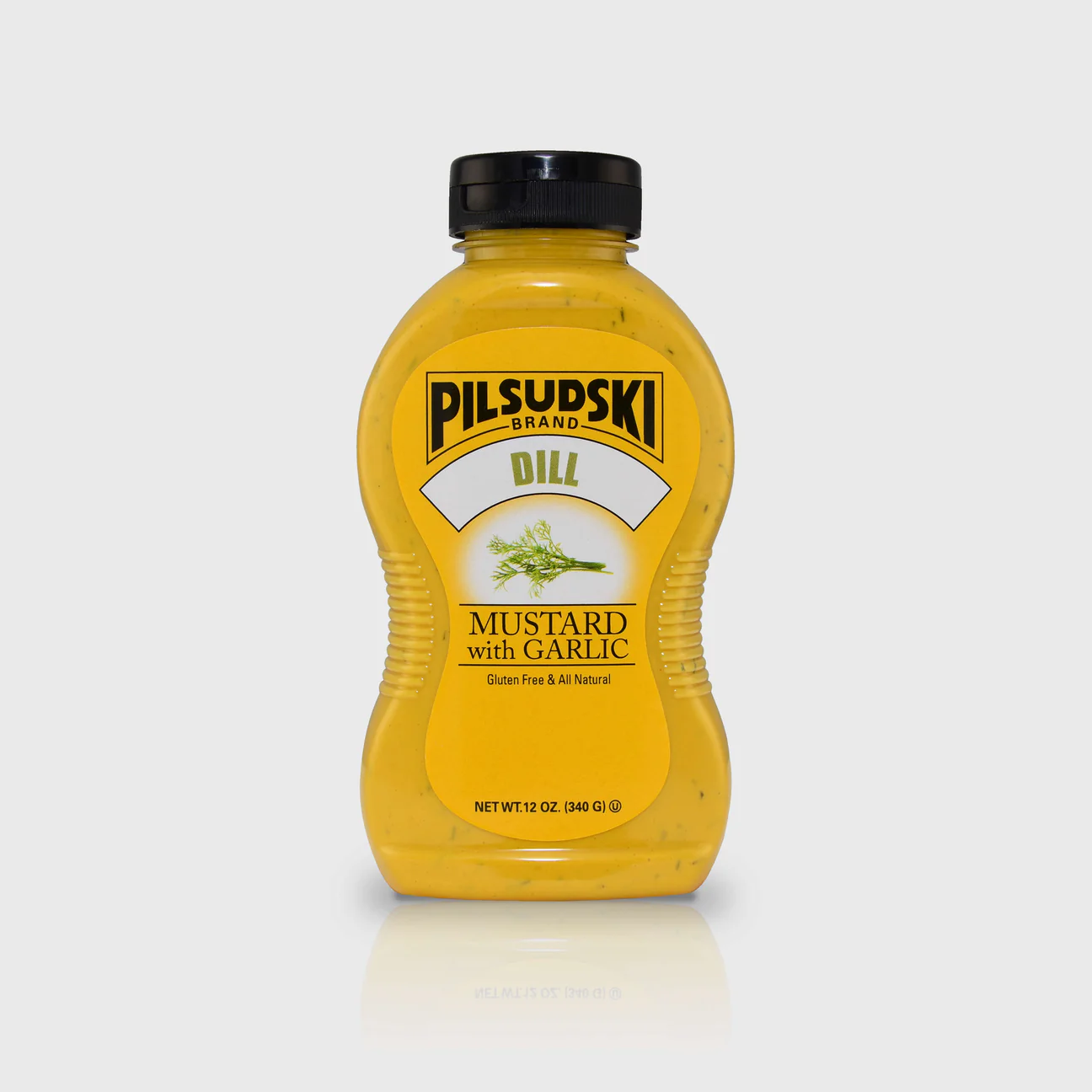A bottle of Pilsudski Dill Pickle Mustard with the brand name and product details visible on the label.