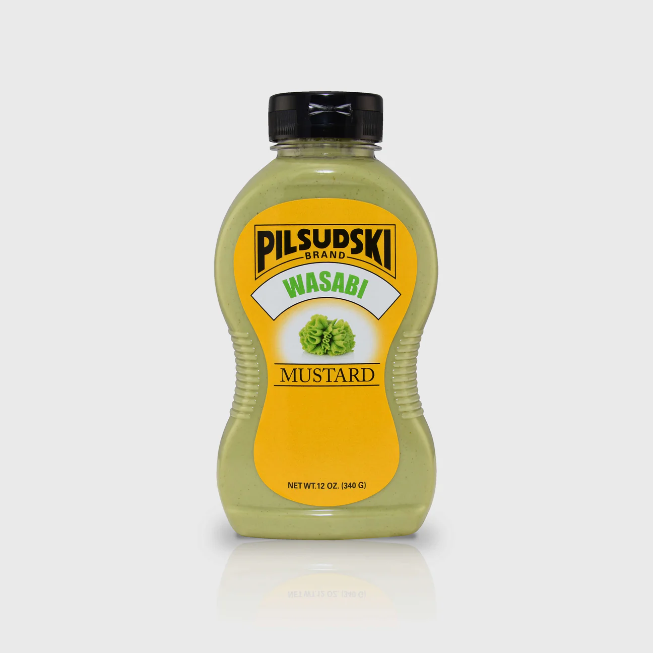 A bottle of Pilsudski Wasabi Mustard with a yellow label, displaying the product name and the image of wasabi leaves.