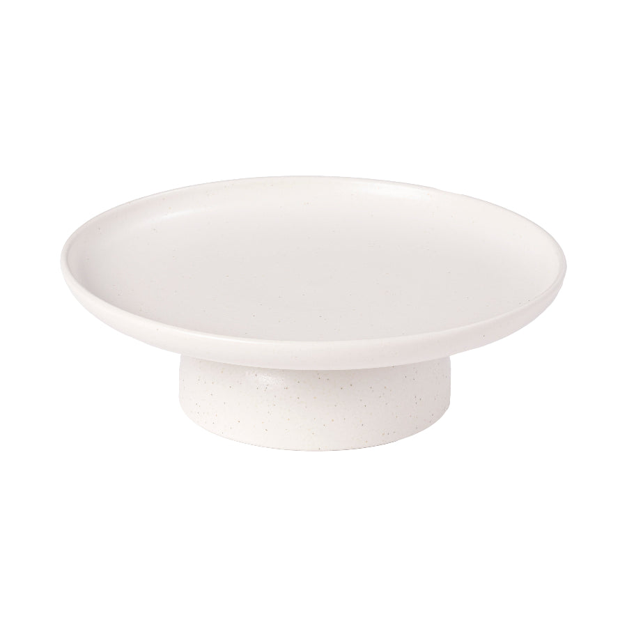 A white ceramic cake stand with a simple and elegant design.