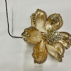 A hair clip featuring a blue and silver floral design with a rhinestone center.