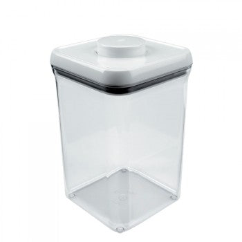 A white OXO POP Containers square-shaped food storage container with a transparent lid.