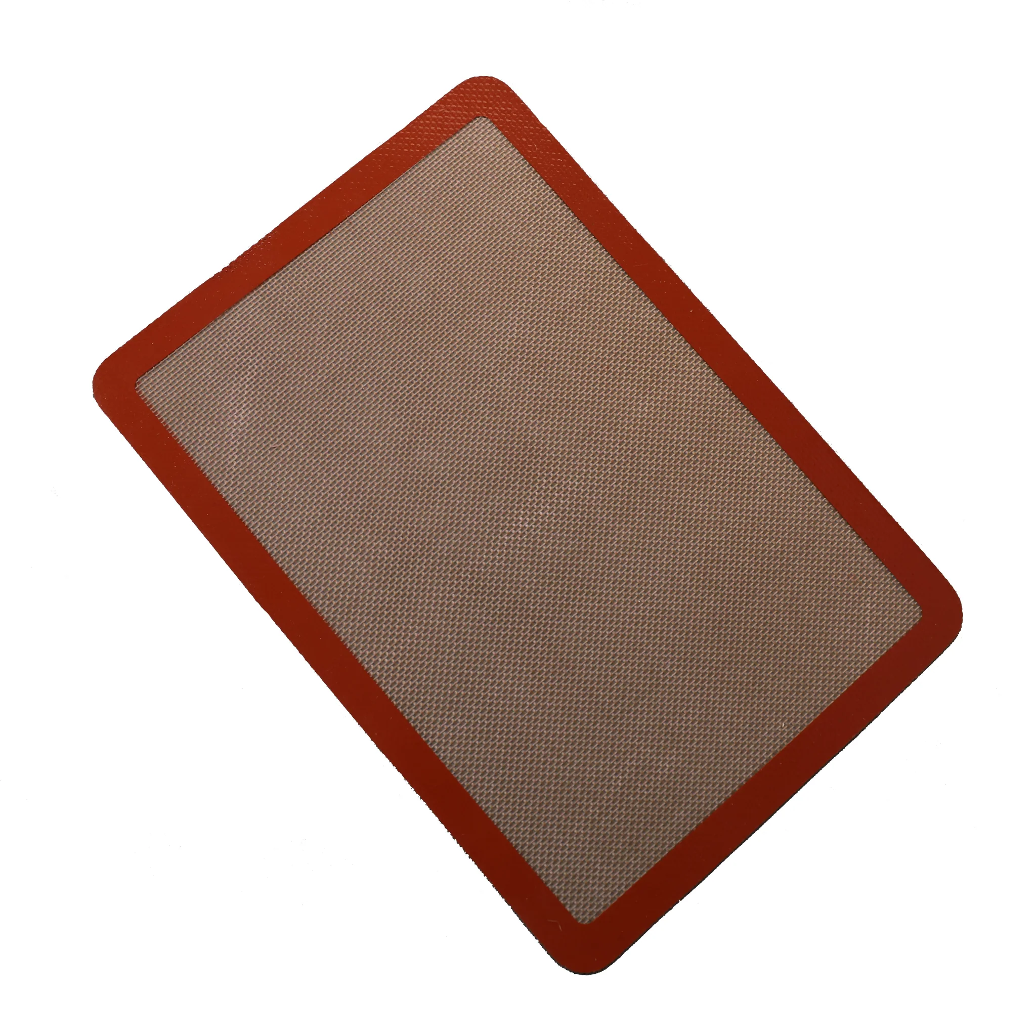 A rectangular silicone baking mat with a red border.