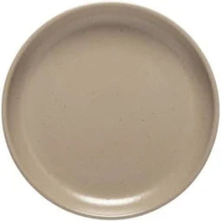 Beige ceramic plate on a white background