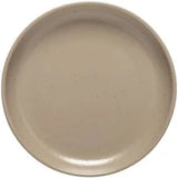 Beige ceramic plate on a white background