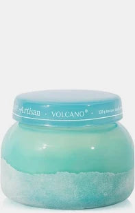 Jar of Volcano body scrub with a blue lid on a white background