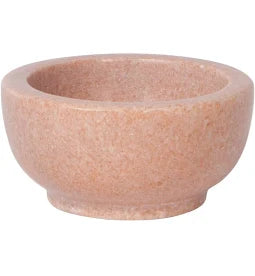 Pink ceramic bowl on a white background