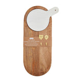 A wooden serving board with a marble paddle and a handle, displayed with its packaging behind it.