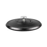 A black 12 inch cast iron lid with a handle in the center.