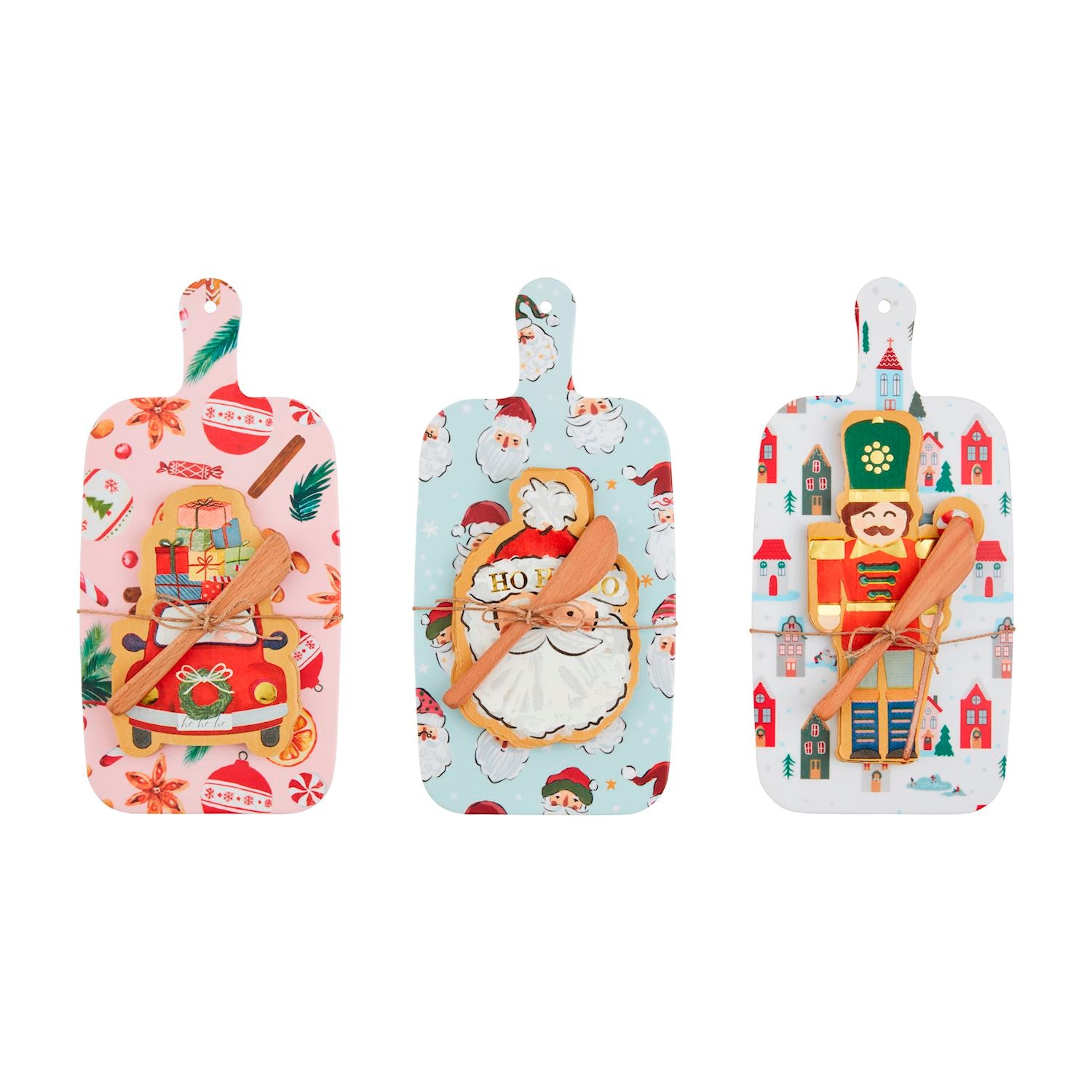 A set of three multicolored Christmas-themed melamine boards with decorative elements such as Santa Claus and holiday motifs.