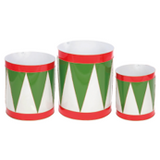 Set of three cylindrical containers with red and green patterns on a white background