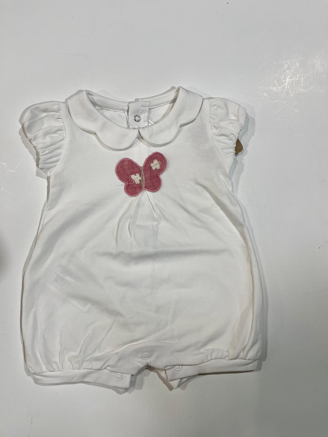 A white short-sleeved baby romper with a Peter Pan collar and a pink butterfly applique on the chest.