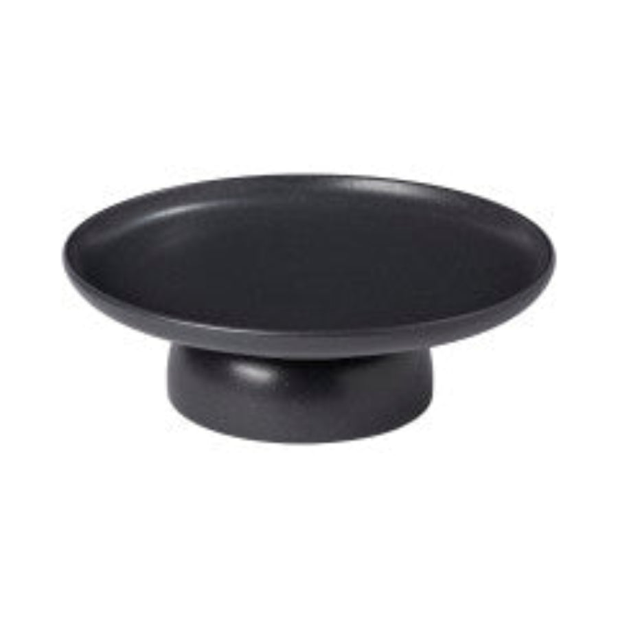 A white ceramic cake stand with a simple and elegant design.