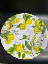 A round decorative platter featuring a vibrant pattern of lemons and basil leaves on a yellow background.