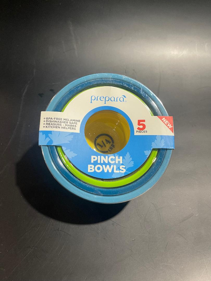 A set of blue melamine pinch bowls with a green lid, branded by Prepara, packaged in a plastic blister pack.