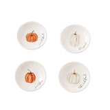 A set of four white ceramic dishes with a pumpkin design and different colors, displayed against a neutral background.