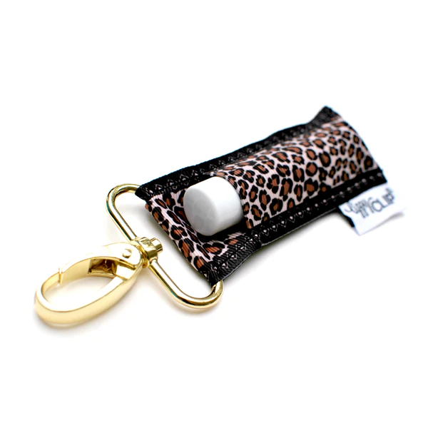 A lip balm clip with a leopard animal print design and a gold-colored clip.