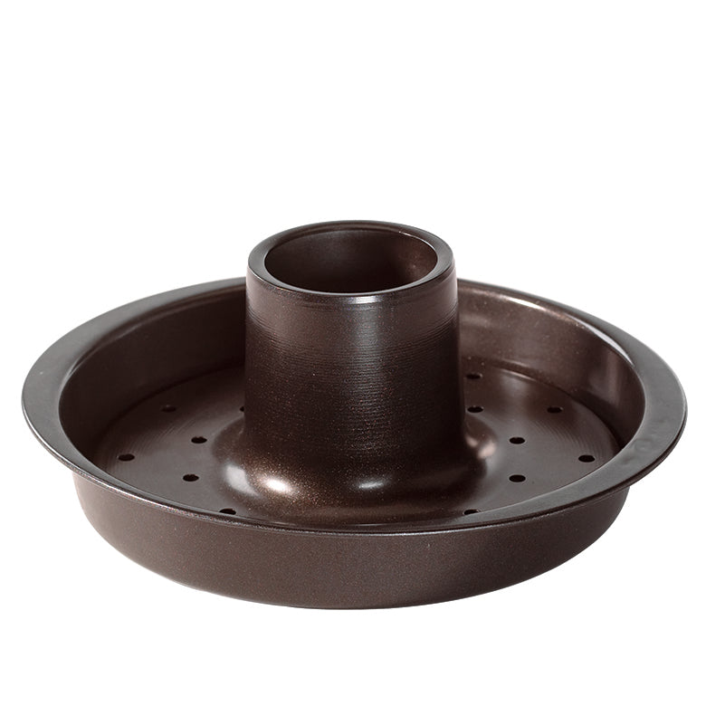 A brown beer can chicken roaster with a central cylindrical holder and perforated base.